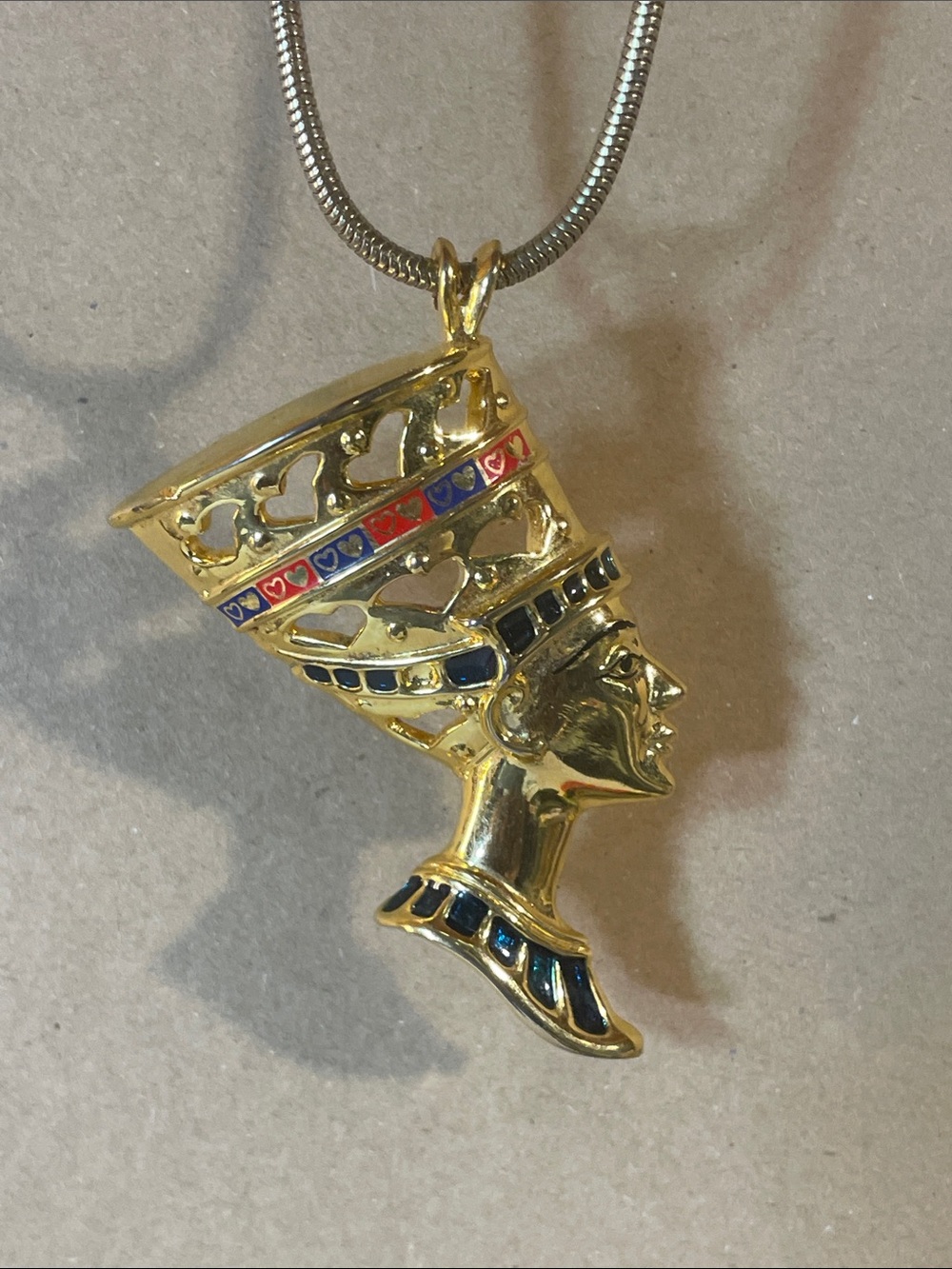 Gold-Tone Nefertiti Pendant Necklace with Blue and Red Enamel Accents